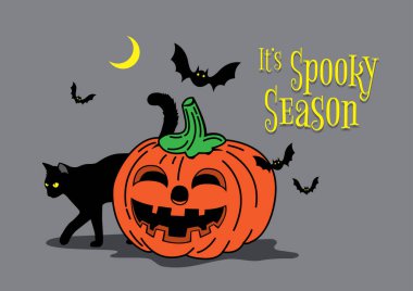 Kara kedi, yarasa ve ay ile süslenmiş Cadılar Bayramı kabağı