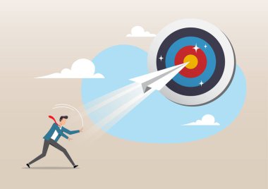 İşadamı dart tahtasından ya da okçu hedef kitlesinden uçan kağıt uçak origamisini fırlatıyor