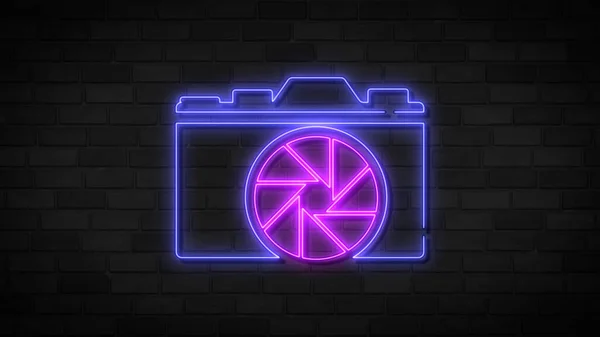 Neon sign of photo camera sign on brick wall background. Bright photography camera symbol.