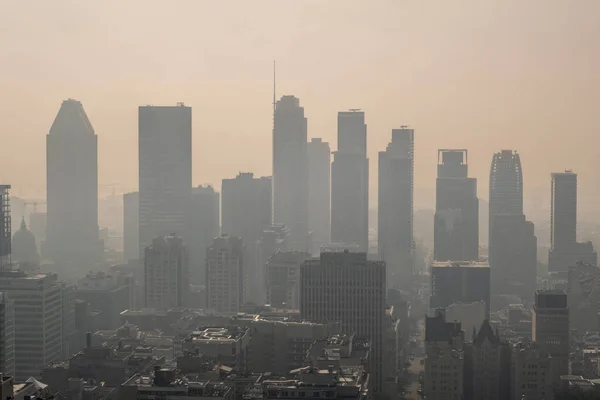 stock image Montreal, CA - 24 June 2023: Montreal Downtown in the smoke of Canadian forest fires