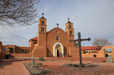 Landscape with San Miguel de Socorro Church - Socorro, New Mexico clipart