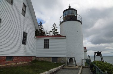 Fog bells and Bass Harbor Head Light Station, Acadia National Park, Maine clipart