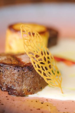 Veal filet mignon with fried potatoes. Delicious . High quality photo