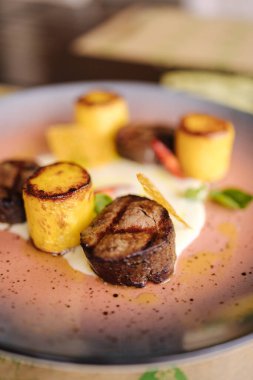 Veal filet mignon with fried potatoes. Delicious . High quality photo