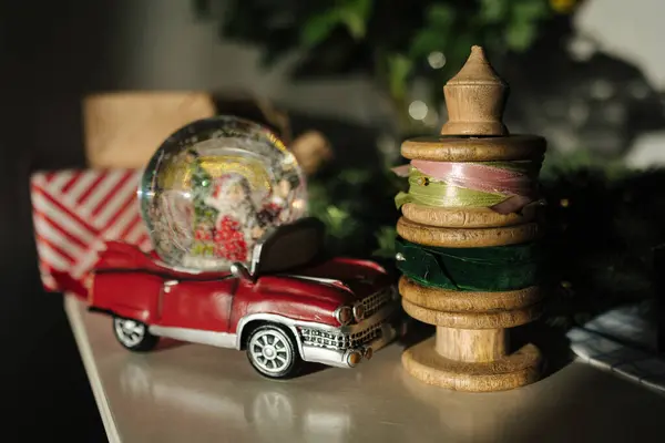 Retro toy Santa car on Christmas gifts. . High quality photo