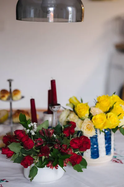 Different bouquets of flowers at home. Present for 8 March. Womans day. Home mood. High quality photo