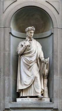 FLORENCE, ITALY-May 30,2023: Statue of Dante Alighieri in the niches of the Uffizi Gallery colonnade, Florence, Italy. clipart