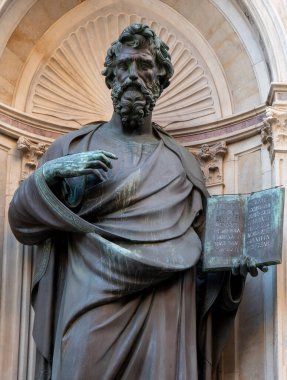 The statue of St. Matthew 1419-1423 by Lorenzo Ghiberti in the external niches of the church of Orsanmichele in Florence. clipart