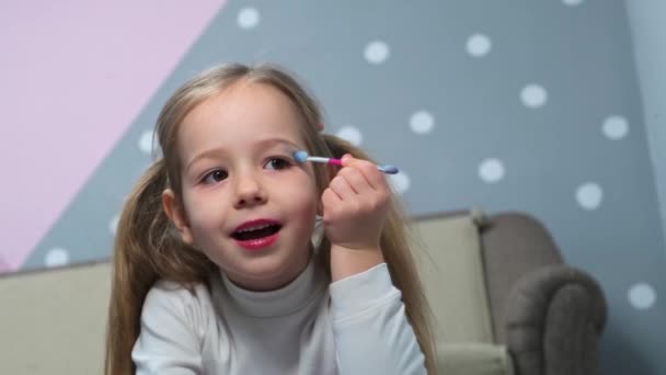 Little Girls Have Fun Make Using Brush Apply Shiny Shadows — Stockvideo