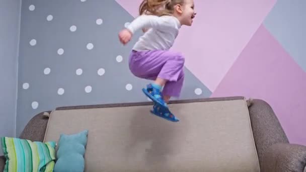 Playful Happy Little Girl Dancing Having Fun Jumping Room Bed — Stok video