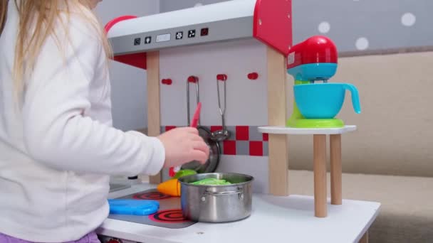 Young Toddler Child Girl Playing Baking Vegetables Toys Oven Kitchen — Stockvideo