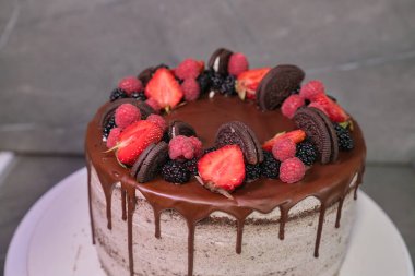 Fresh delicious homemade Chocolate cake strawberry and Oreo . High quality photo