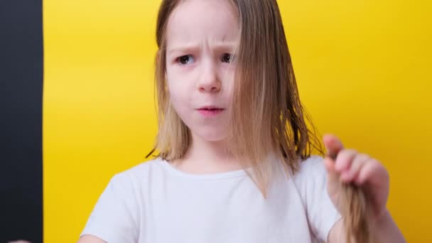 Funny Little Girl Holds Shake Hands Cropped Hair Two Braids — Stockvideo