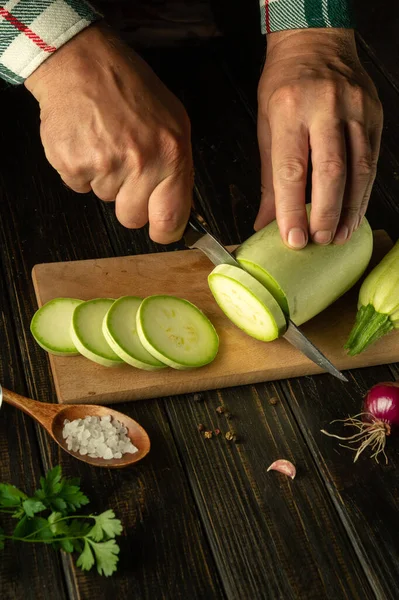 Chef Cuts Vegetable Marrow Small Pieces Knife Fire Cooking Delicious — Stock Photo, Image
