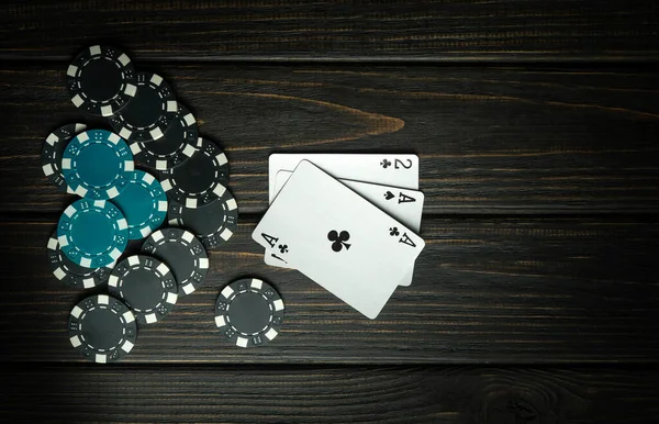 Unsuccessful combination of cards in the popular game of poker. Lose or go bankrupt in a card game or become a loser. Place for advertising on a dark background.