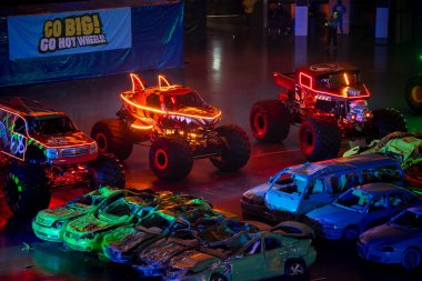 Lisbon, Portugal - March 2, 2024: HOT WHEELS MONSTER TRUCKS LIVE GLOW PARTY in Arena clipart