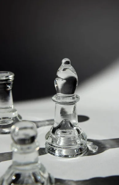 Bishop Glass Chess Piece in Formation - Closeup, Light and Shadow