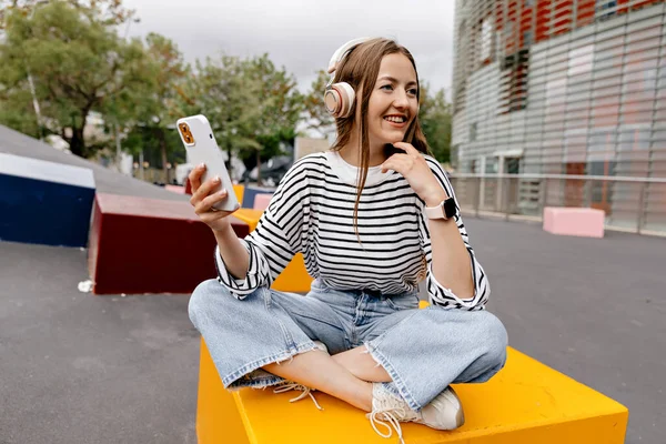Smiling Happy Woman Holding Phone Looking Aside While Siting Rest — Stok Foto