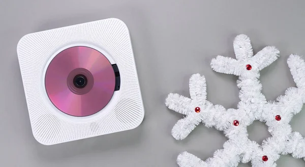 Stylish White Portable Compact Player Pink Disc Playing Christmas Music — Stock Photo, Image