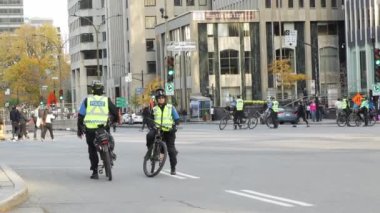 Police closed off main road for protesters safety. Police closed the road from car traffic. Montreal, QC Canada - October 22, 2022