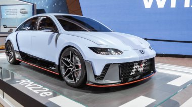 Crowds looking at new car models at Auto show. Hyundai RN22e electric car on display. National Canadian Auto Show with many car brands. Toronto ON Canada Feb 19, 2023