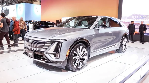 stock image Crowds looking at new car models at Auto show. Cadillac car on display. National Canadian Auto Show with many car brands. Toronto ON Canada Feb 19, 2023