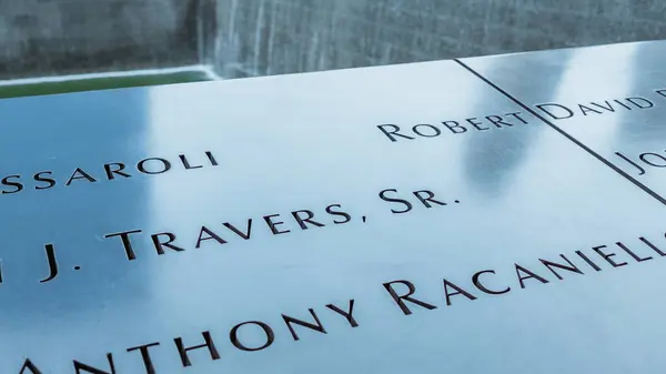 stock image Memorial at Ground Zero Manhattan for September 11 Terrorist Attack with Engraved Names of Victims. Patriot Day - New York NY USA 2023-07-30.