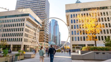 The Ring art piece in downtown Montreal. Big steel circle structure at the main entrance to Esplanade of Place Ville Marie. Montreal QC Canada 10.22.2022.