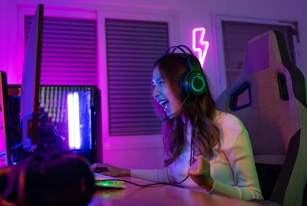 Asian Gamer Playing Online Video Game Winning Excited Lighting Effect — Stock Photo, Image
