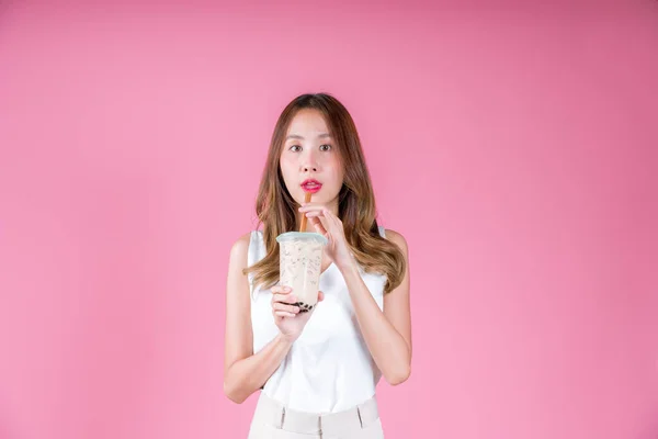 stock image Asian woman girl drinking bubble milk tea excited emotion, Happy beverage drink on the pink background