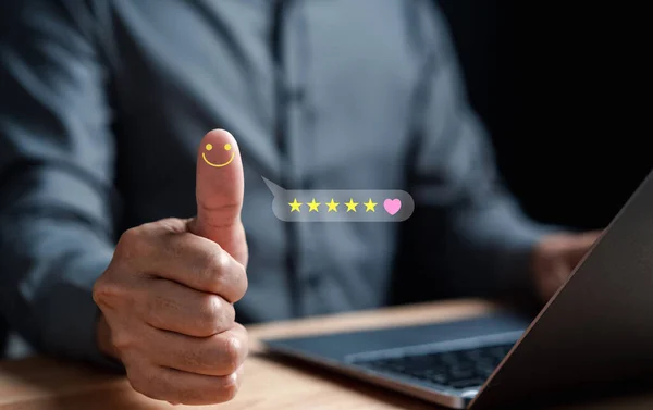 Businessman with thumb up Positive emotion happy five star and heart icon, Customer satisfaction feedback review concept. Customer service experience and business satisfaction.