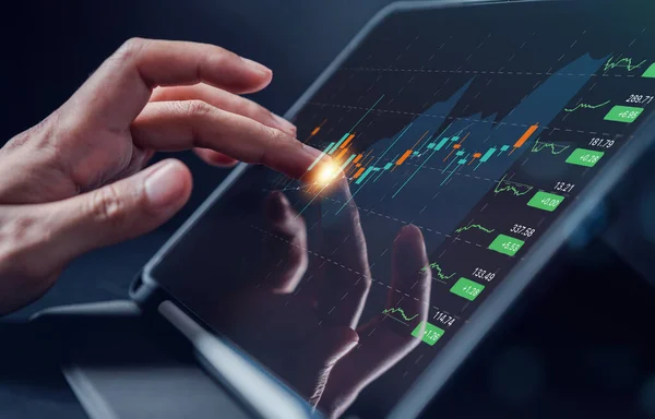 Investor Planning and strategy, Stock market, business people working with technical price graph and indicator, candlestick chart and stock trading tablet screen financial investment growth concept.