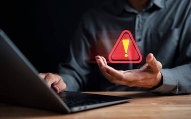System warning caution sign for notification error and maintenance concept. cyber attack on computer network. Cybersecurity vulnerability, data breach, illegal connection, compromised information.