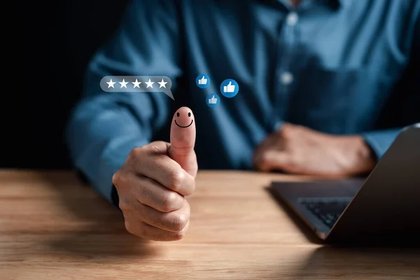 Businessman with thumb up Positive emotion happy five star and like, love icon, Customer satisfaction feedback review concept. Customer service experience and business satisfaction.