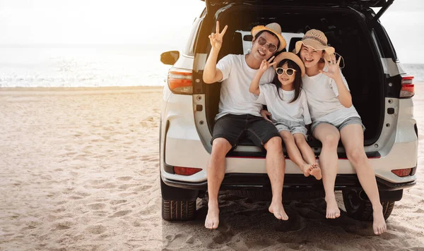 Stock image Family with Car travel driving road trip summer vacation in car in the sunset, Dad, mom and daughter happy traveling enjoy holidays and relaxation together get the atmosphere and go to destination 