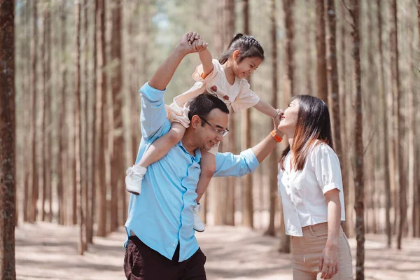 stock image Happy family in the nature travel. family on weekend playing together in the forest.