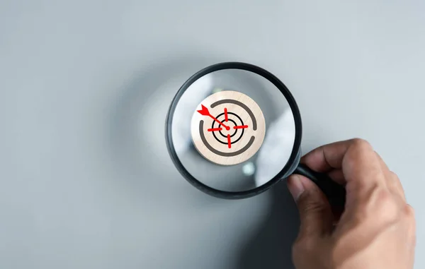 stock image Magnifier glass focus to aiming target icon for planning development leadership and customer target group concept.