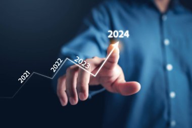 Growth up of Happy new year resolution planning and challenge strategy business with arrow up in New year 2024 with chart graph and countdown merry christmas and happy new year concept.	