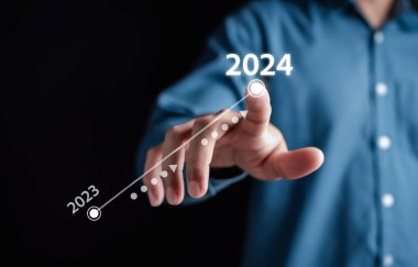 Mutlu Yeni Yıl Çözüm Planlama ve Yeni Yıl 2024 'te grafik grafiği ve geri sayım grafiğiyle mutlu noeller ve mutlu yeni yıl konseptiyle meydan okuma stratejisi işiyle büyüdü..