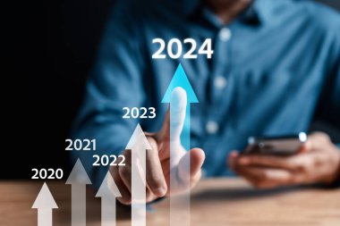 Yeni yıla 2024 hırsla başlamak ve geri sayım mutlu noeller ve mutlu yıllar, yeni yılda iş planlama ve meydan okuma stratejisi 2024.