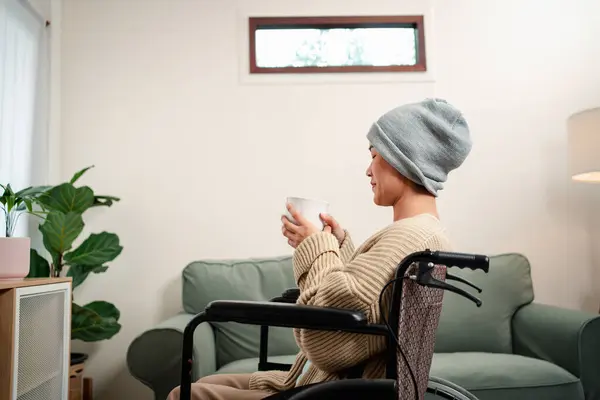 stock image Young woman have a sick with cancer her worry and stress feeling lifestyle in living room at home.