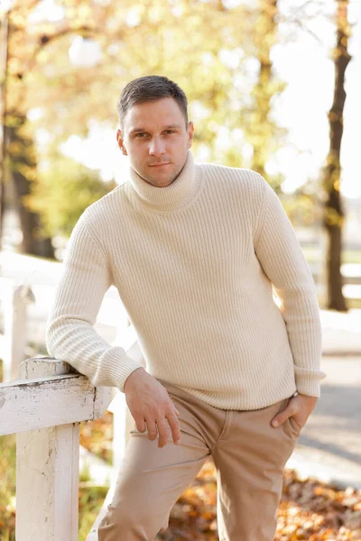 Portrait Young Man White Knit Casual Jumper Looks Confidently Camera — Stock Fotó