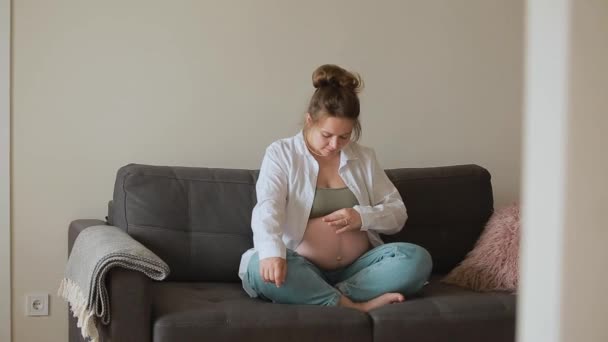Young Pregnant Woman Stroking Caressing Her Big Naked Belly Enjoy — Stock Video