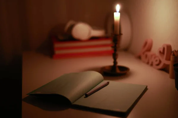 Dark Room Burning Candle Candlestick Lighting Work Desk Paper Notebook —  Fotos de Stock