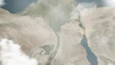 Dünya uzaydan Kahire 'ye, Mısır' dan Tahrir Meydanı 'na yakınlaşır. Arkasından bulutlar ve atmosferden uzaya zum geliyor. Uydu görüntüsü. Seyahat girişi