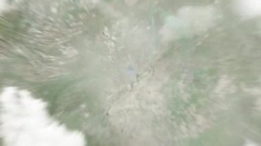 Dünya uzaydan Changchun, Çin 'e yakınlaşacak. Arkasından bulutlar ve atmosferden uzaya zum geliyor. Uydu görüntüsü. Seyahat girişi