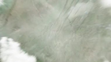 Dünya uzaydan Chongqing, Çin 'e yakınlaştırıyor. Arkasından bulutlar ve atmosferden uzaya zum geliyor. Uydu görüntüsü. Seyahat girişi