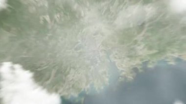 Dünya uzaydan Foshan, Çin 'e yakınlaşır. Arkasından bulutlar ve atmosferden uzaya zum geliyor. Uydu görüntüsü. Seyahat girişi