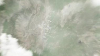 Dünya uzaydan Handan 'a, Longhu Park' taki Çin 'e yakınlaşacak. Arkasından bulutlar ve atmosferden uzaya zum geliyor. Uydu görüntüsü. Seyahat girişi