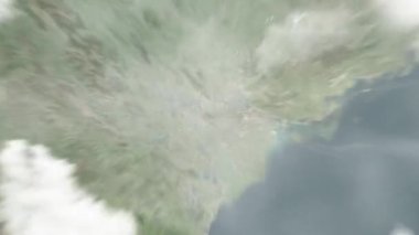 Dünya uzaydan Hanoi 'ye, Vietnam' dan Ho Chi Minh 'in mozolesine yakınlaşacak. Arkasından bulutlar ve atmosferden uzaya zum geliyor. Uydu görüntüsü. Seyahat girişi